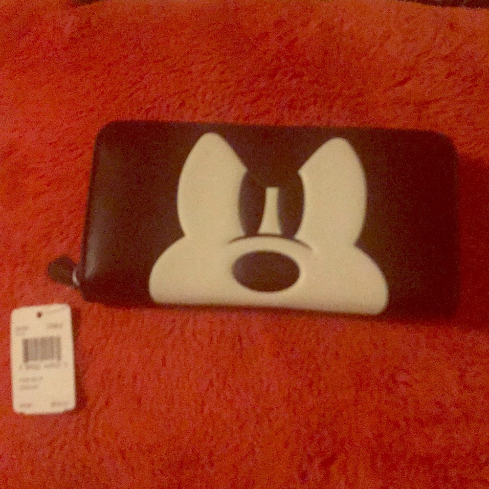 Brand new Coach Mickey Mouse wallet.